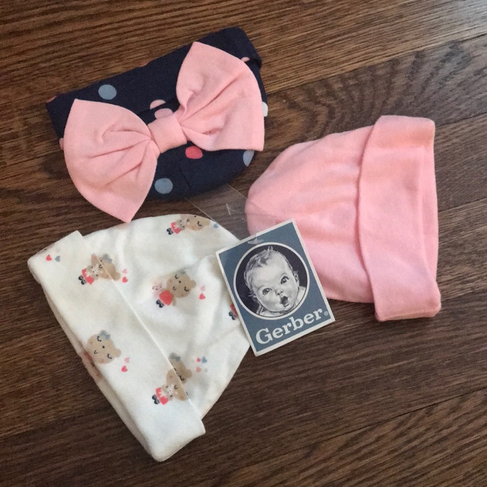 NWT. Gerber baby girls hats. Set of three.